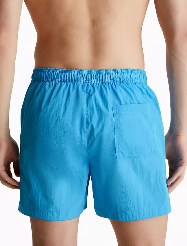 Badshorts i nylon med dragsko i midjan Badshorts i nylon med dragsko i midjan