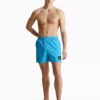 Badshorts i nylon med dragsko i midjan Badshorts i nylon med dragsko i midjan