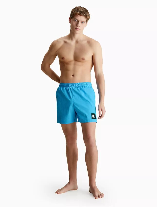 Badshorts i nylon med dragsko i midjan Badshorts i nylon med dragsko i midjan