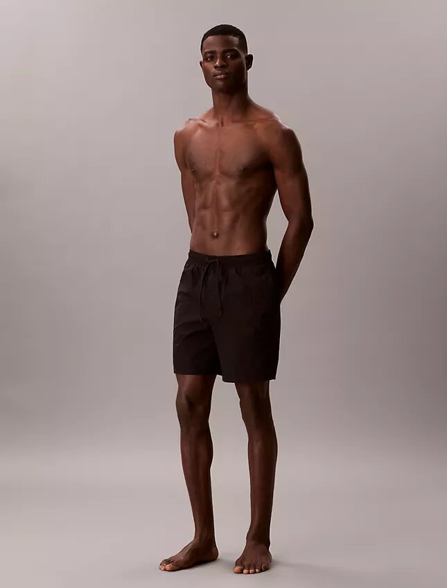 Badshorts med logotyp Badshorts med logotyp