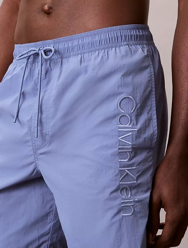 Badshorts med logotyp Badshorts med logotyp