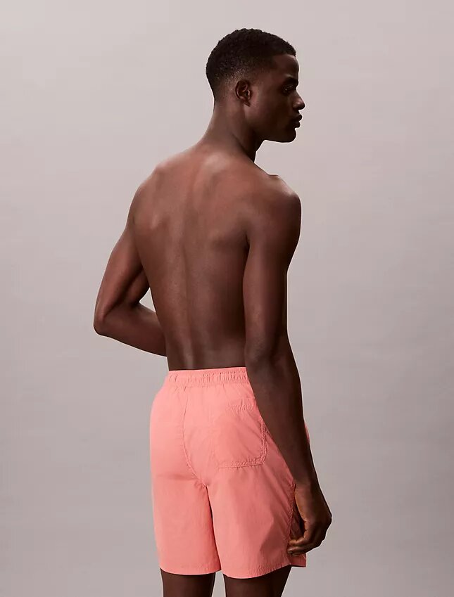 Badshorts med logotyp Badshorts med logotyp