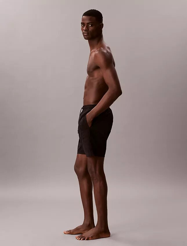 Badshorts med logotyp Badshorts med logotyp