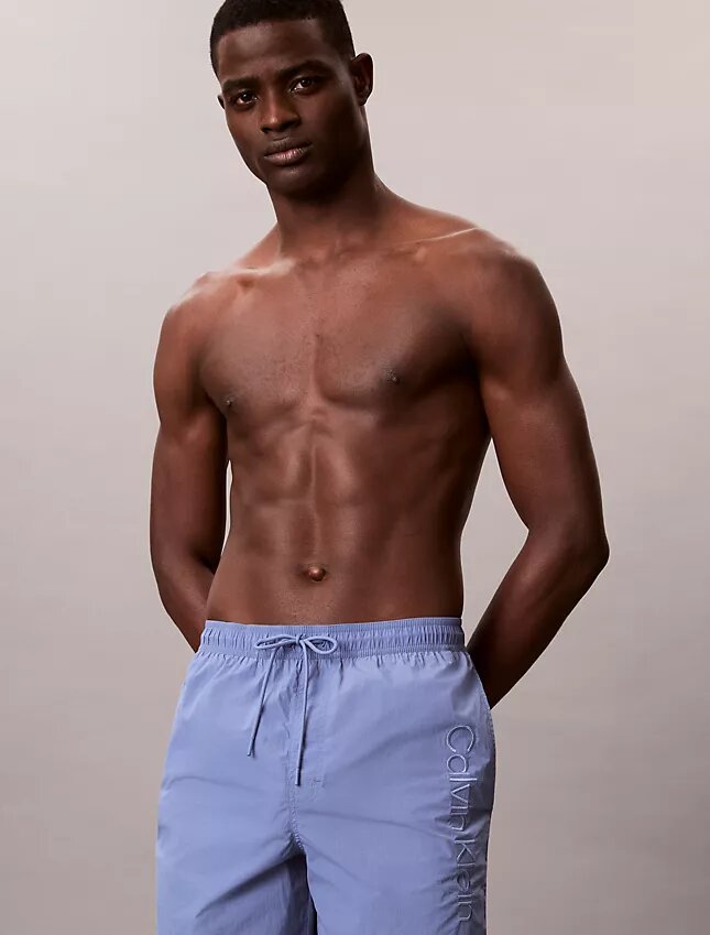 Badshorts med logotyp Badshorts med logotyp