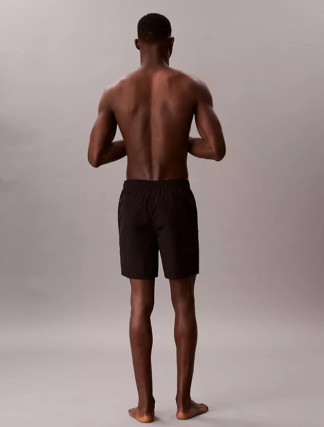Badshorts med logotyp Badshorts med logotyp
