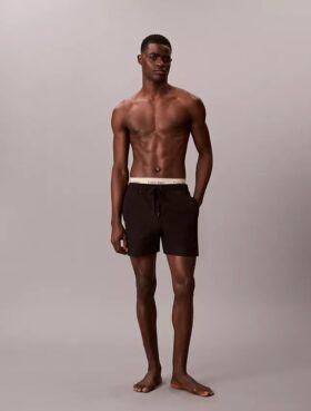 Badshorts med logotyp i midjan Badshorts med logotyp i midjan