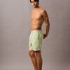 Badshorts med logotyp i midjan Badshorts med logotyp i midjan