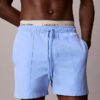 Badshorts med logotyp i midjan Badshorts med logotyp i midjan