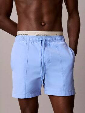 Badshorts med logotyp i midjan Badshorts med logotyp i midjan