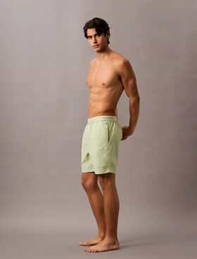 Badshorts med logotyp i midjan