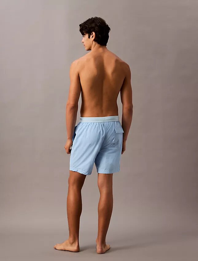 Badshorts med logotyp i midjan Badshorts med logotyp i midjan