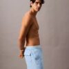 Badshorts med logotyp i midjan Badshorts med logotyp i midjan
