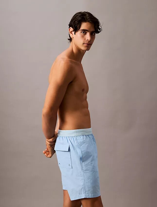 Badshorts med logotyp i midjan Badshorts med logotyp i midjan