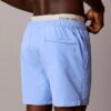 Badshorts med logotyp i midjan Badshorts med logotyp i midjan