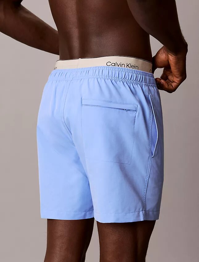 Badshorts med logotyp i midjan Badshorts med logotyp i midjan