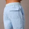 Badshorts med logotyp i midjan Badshorts med logotyp i midjan
