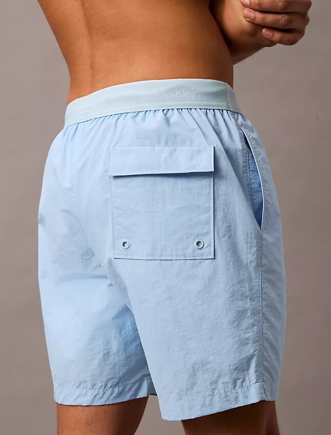 Badshorts med logotyp i midjan Badshorts med logotyp i midjan