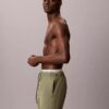 Badshorts med logotyp i midjan Badshorts med logotyp i midjan