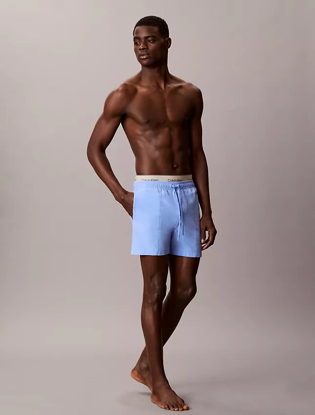 Badshorts med logotyp i midjan Badshorts med logotyp i midjan