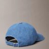 Baseballkeps i tvättad Denim med broderad logotyp Baseballkeps i tvättad Denim med broderad logotyp