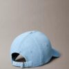 Baseballkeps i tvättad Denim med broderad logotyp Baseballkeps i tvättad Denim med broderad logotyp