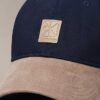 Baseballkeps med emblem och färgblock