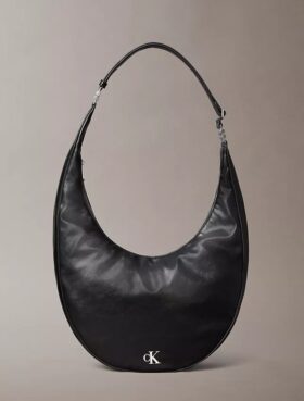 Böjd, omvandlingsbar crossbody-väska Böjd, omvandlingsbar crossbody-väska