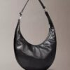 Böjd, omvandlingsbar crossbody-väska Böjd, omvandlingsbar crossbody-väska