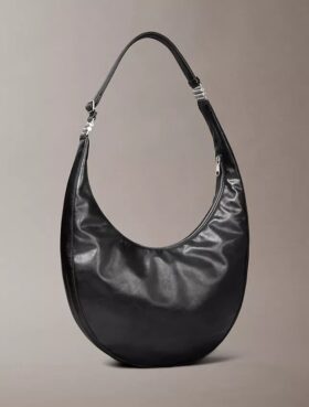 Böjd, omvandlingsbar crossbody-väska Böjd, omvandlingsbar crossbody-väska