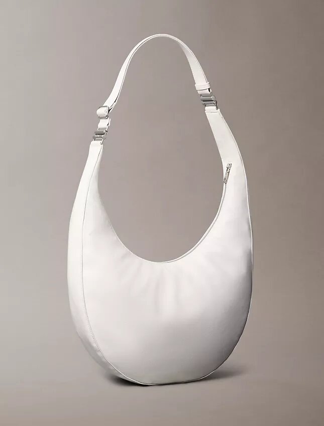 Böjd, omvandlingsbar crossbody-väska Böjd, omvandlingsbar crossbody-väska