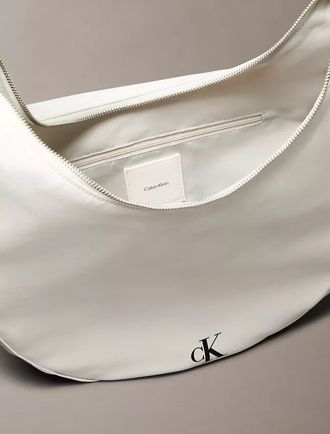 Böjd, omvandlingsbar crossbody-väska Böjd, omvandlingsbar crossbody-väska