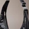 Böjd, omvandlingsbar crossbody-väska Böjd, omvandlingsbar crossbody-väska