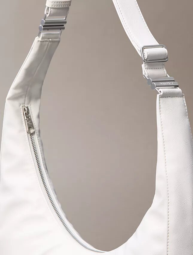 Böjd, omvandlingsbar crossbody-väska Böjd, omvandlingsbar crossbody-väska