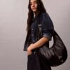 Böjd, omvandlingsbar crossbody-väska Böjd, omvandlingsbar crossbody-väska