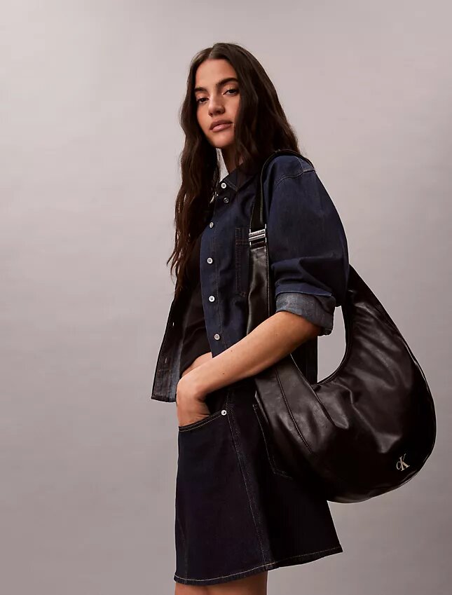Böjd, omvandlingsbar crossbody-väska Böjd, omvandlingsbar crossbody-väska