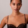 CK Black bodysuit i blommig spets CK Black bodysuit i blommig spets