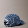 Denim-baseballkeps med emblem-logotyp över hela ytan