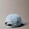 Denim-baseballkeps med emblem-logotyp över hela ytan Denim-baseballkeps med emblem-logotyp över hela ytan