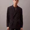 Dubbelknäppt blazer i en blandning av ull och gabardin Dubbelknäppt blazer i en blandning av ull och gabardin