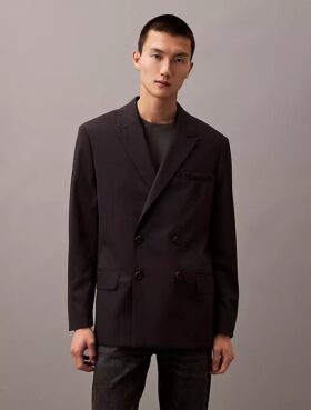 Dubbelknäppt blazer i en blandning av ull och gabardin Dubbelknäppt blazer i en blandning av ull och gabardin