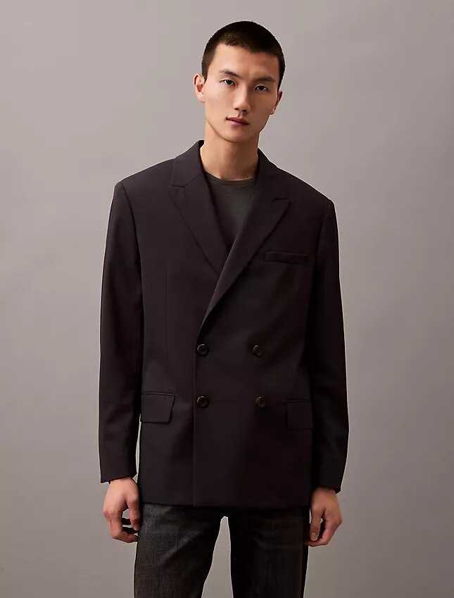 Dubbelknäppt blazer i en blandning av ull och gabardin Dubbelknäppt blazer i en blandning av ull och gabardin