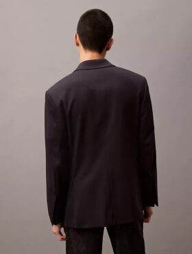 Dubbelknäppt blazer i en blandning av ull och gabardin Dubbelknäppt blazer i en blandning av ull och gabardin