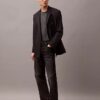 Dubbelknäppt blazer i en blandning av ull och gabardin Dubbelknäppt blazer i en blandning av ull och gabardin