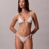 Enfärgad bikini-underdel med knytband i sidorna Enfärgad bikini-underdel med knytband i sidorna