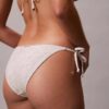 Enfärgad bikini-underdel med knytband i sidorna Enfärgad bikini-underdel med knytband i sidorna