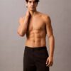 Enfärgade badshorts med 18 cm innerbenslängd Enfärgade badshorts med 18 cm innerbenslängd