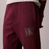 Fleece-joggingbyxor med Monogram-grafik Fleece-joggingbyxor med Monogram-grafik