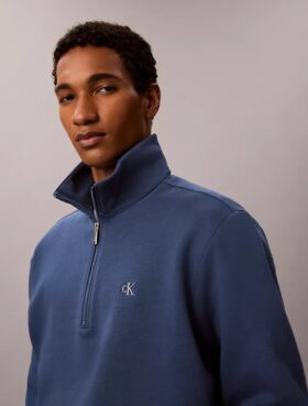 Fleece-tröja med kvartslås och arkivlogotyp