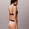 Grafisk monogram-Thong i stretchig Microfiber Grafisk monogram-Thong i stretchig Microfiber
