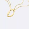 Halsband med rund, organisk hänge Halsband med rund, organisk hänge